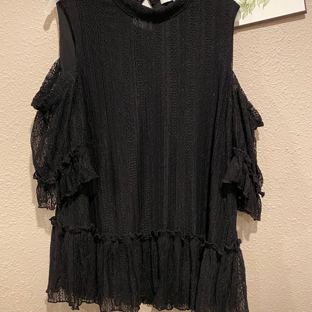 Women open shoulder shirt